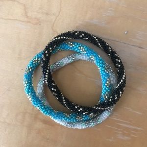 Three Alex and ani bracelets